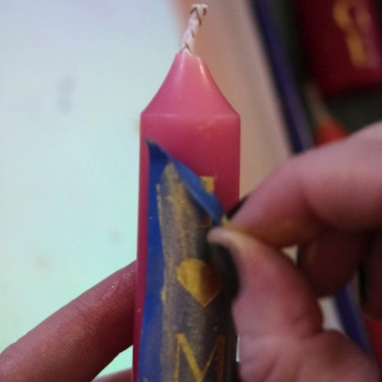 Video shows the stenciling process of the inscribed Spell Candles
